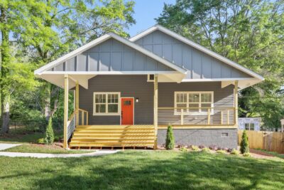 3573 Orchard Circle Decatur Bungalow front porch orange door Peachcrest Belvedere Park Homes For Sale